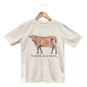 "Raised in a barn" Cow Toddler/Youth Tee